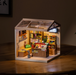 ROBOTIME Super Creator Fascinating Book Store DIY Miniature House Kit - Super Creator